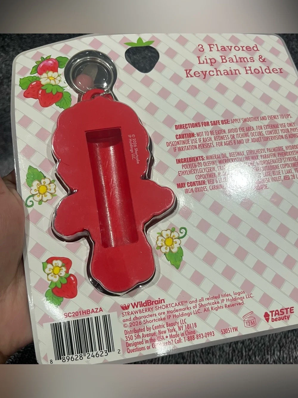 Strawberry Shortcake flavored lip balm set includes a keychain holder